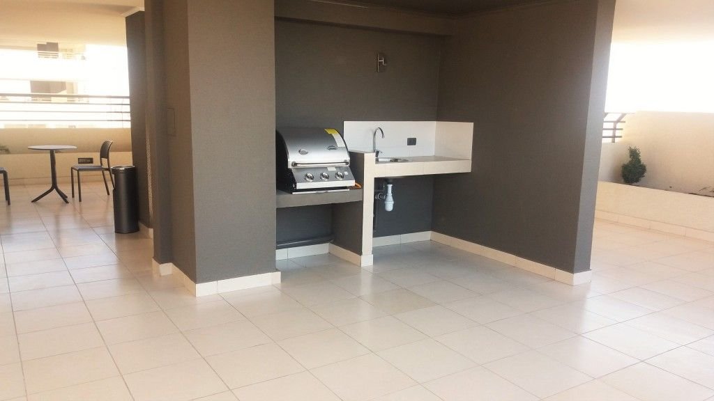 venta departamento estudio en san martin metro santa ana – con bodega (13)